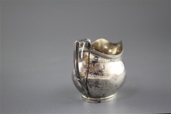 A George III silver helmet shaped cream jug, by Charles Hougham?, London, 1806, height, 85mm, 3oz.